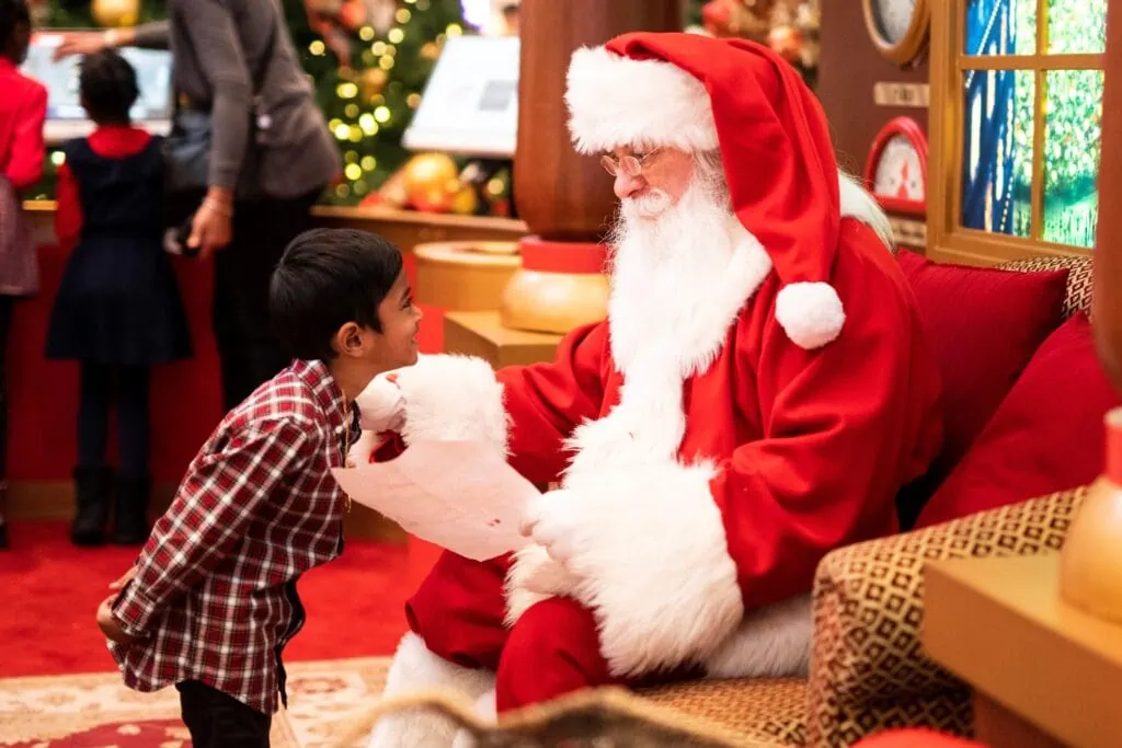 Young person visiting Santa