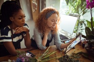 Two young business women running their sensory-friendly business.