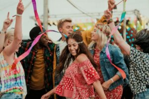 Group of people dancing at a sensory-friendly music festival.