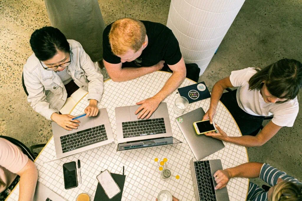 A crowded coworking table