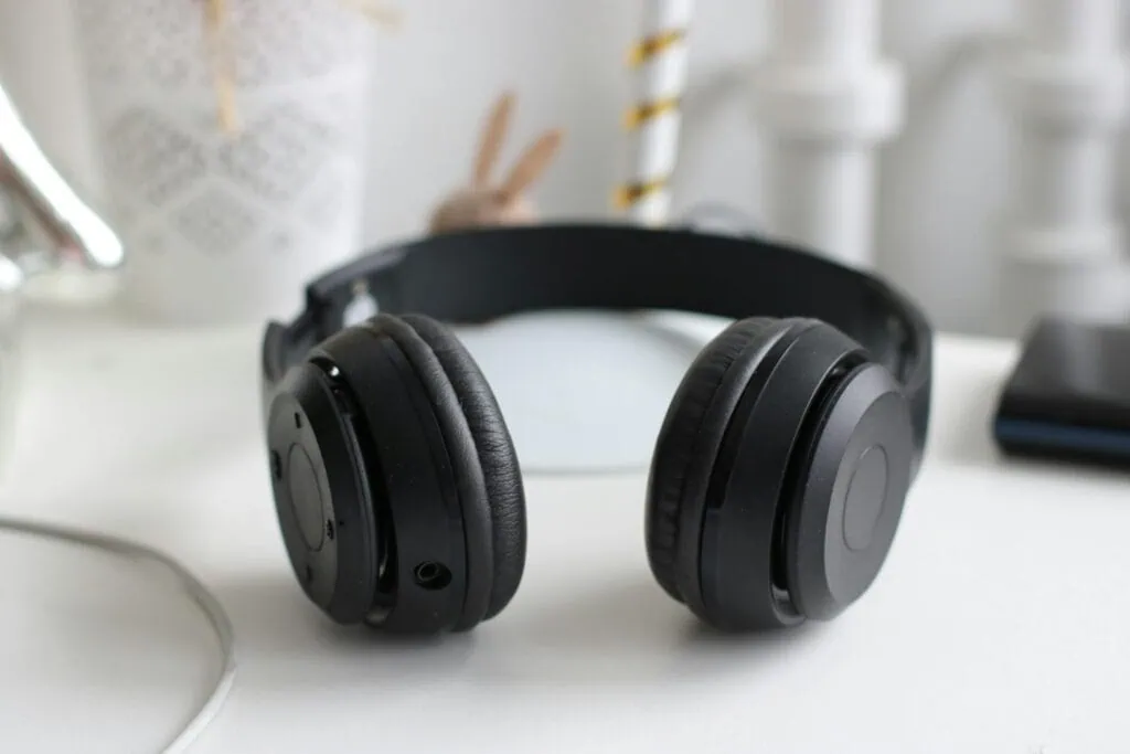 Noise cancelling headphones laying on a desk