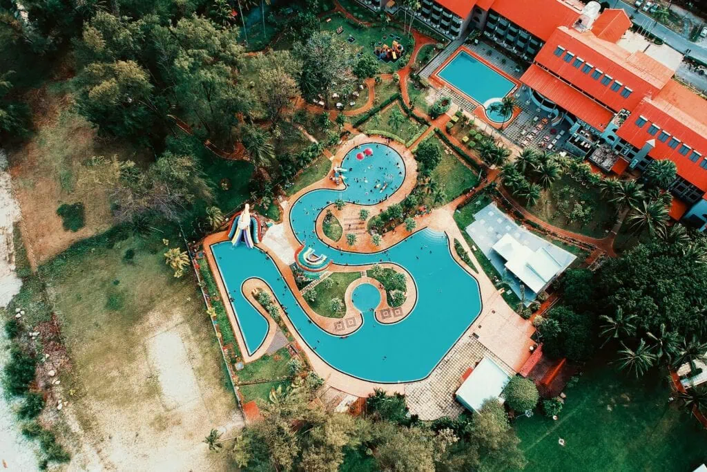 overhead view of a resort  with a large pool